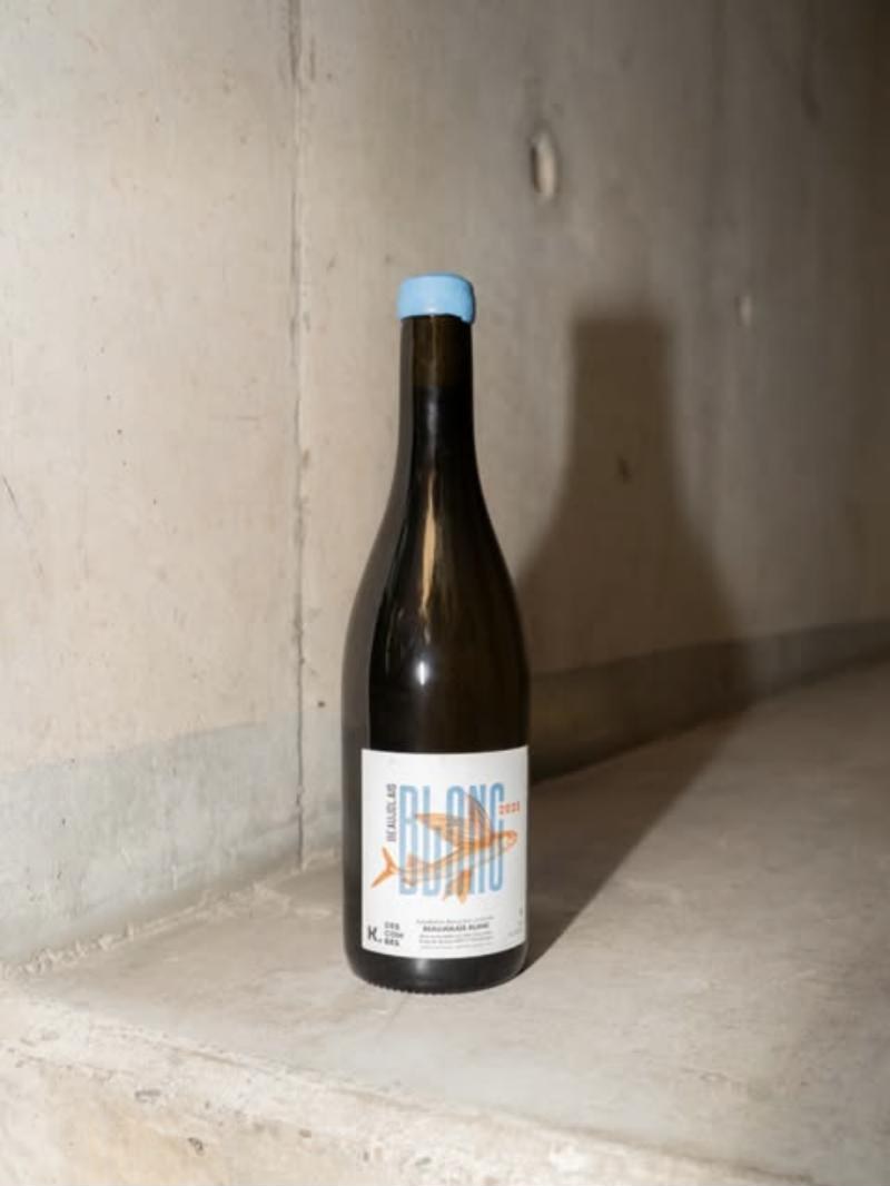 Bottle of Blanc on a concrete ledge
